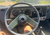Steering wheel with instrument cluster in the back.